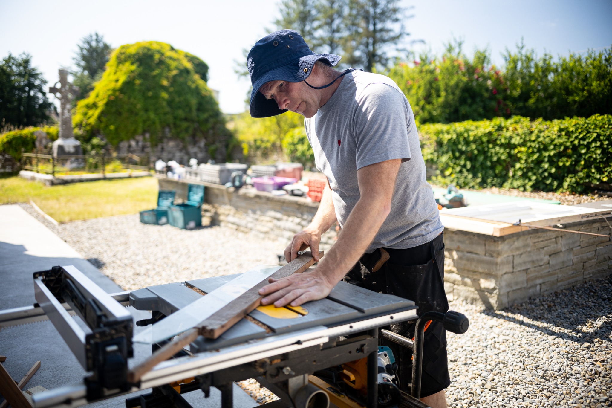 Jamie working with timber on site